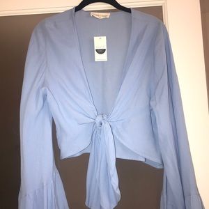 Victoria and Sophia cropped bell sleeve blouse